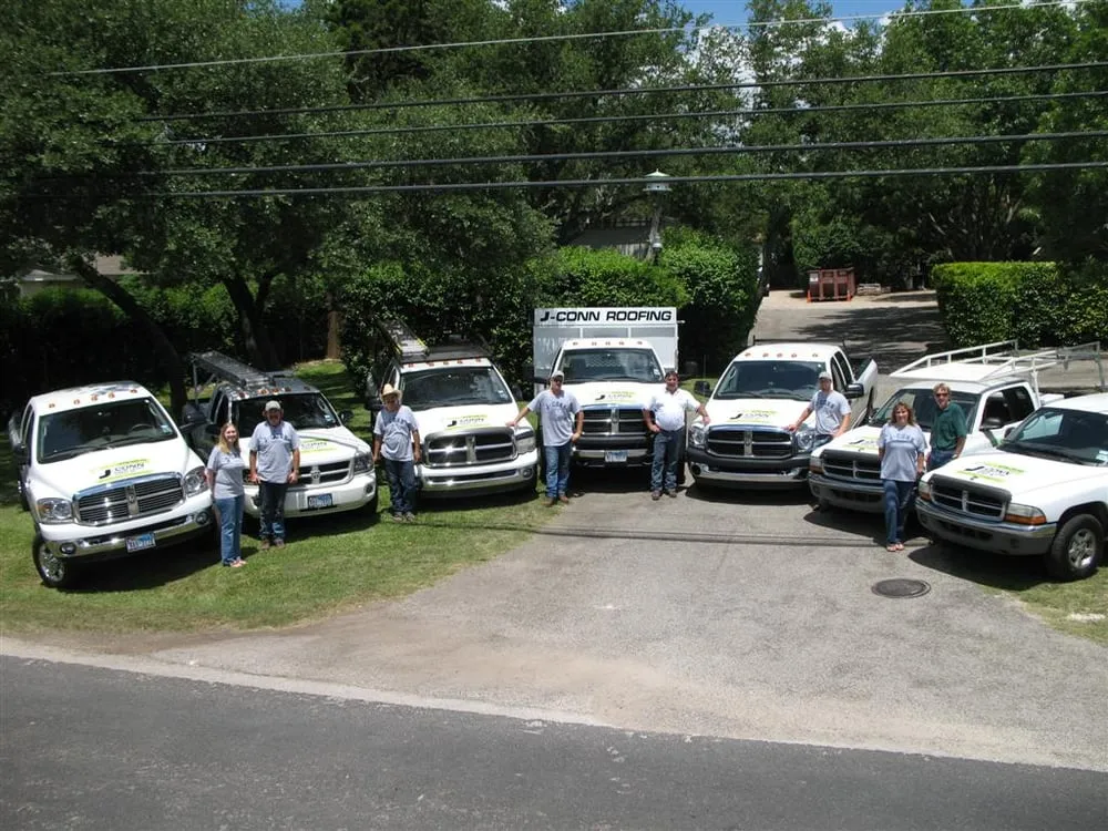 J-Conn Roofing team with fleet of trucks
